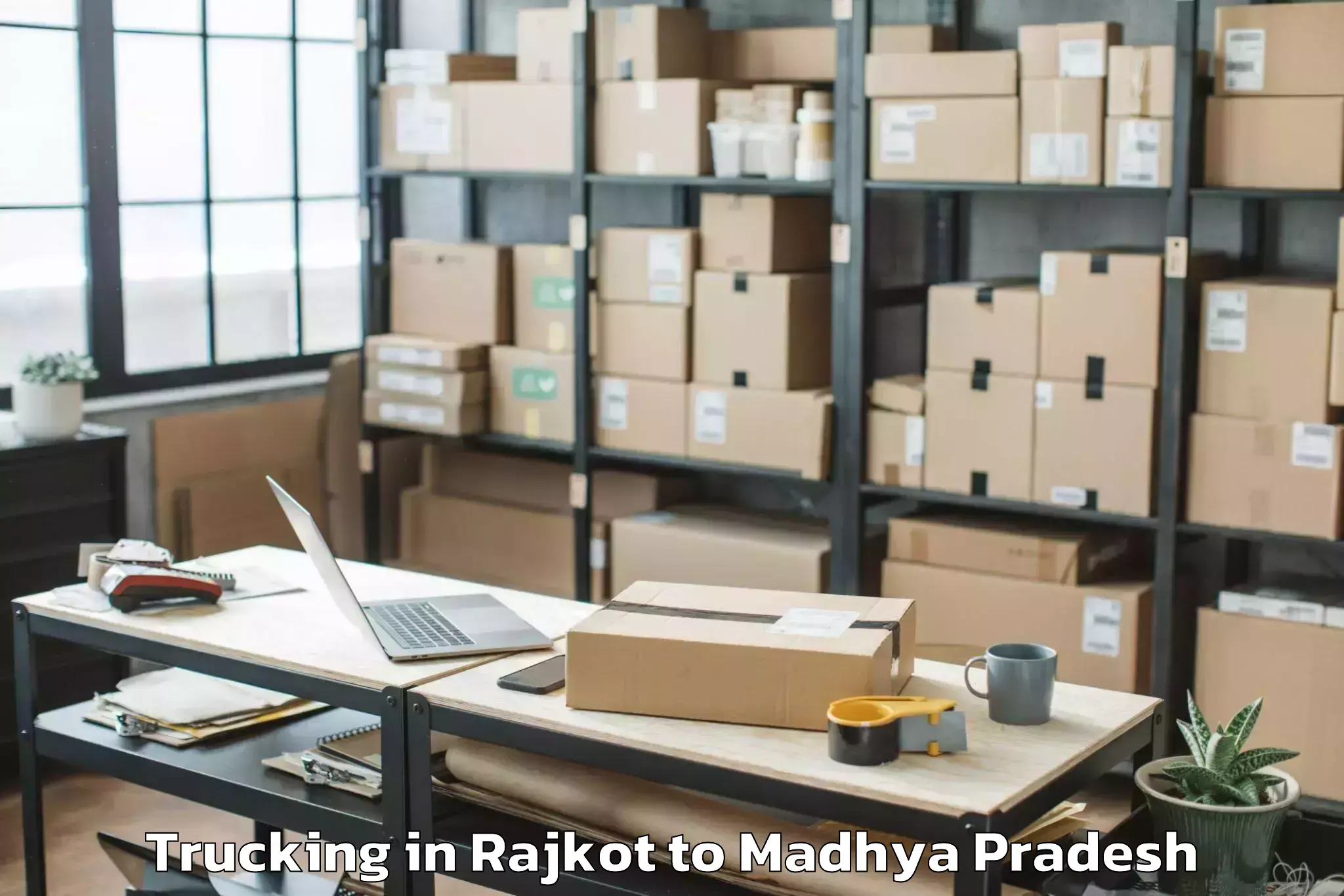 Top Rajkot to Mauganj Trucking Available